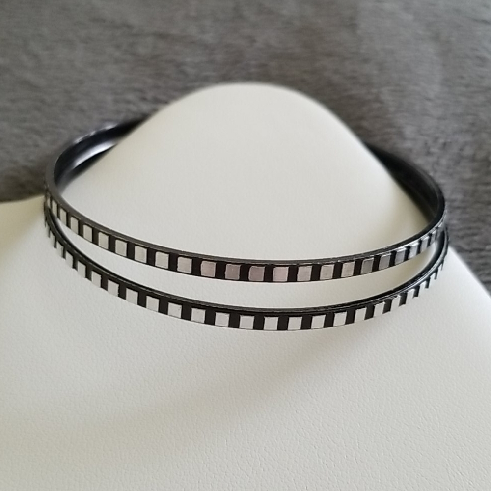 Two Black and Silver Bangles